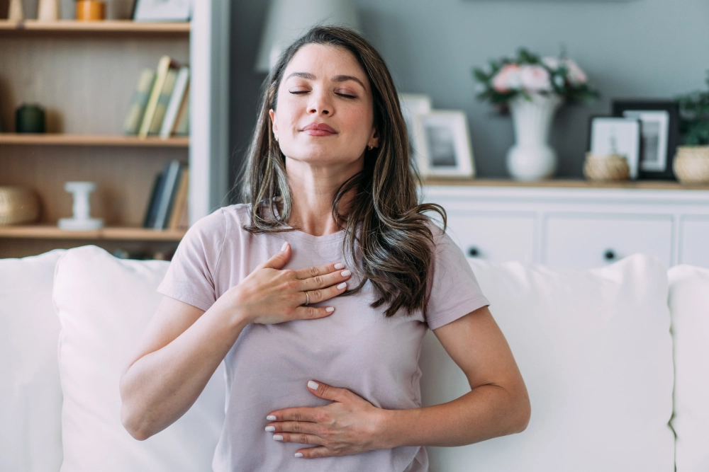 Woman practicing deep breathing exercises